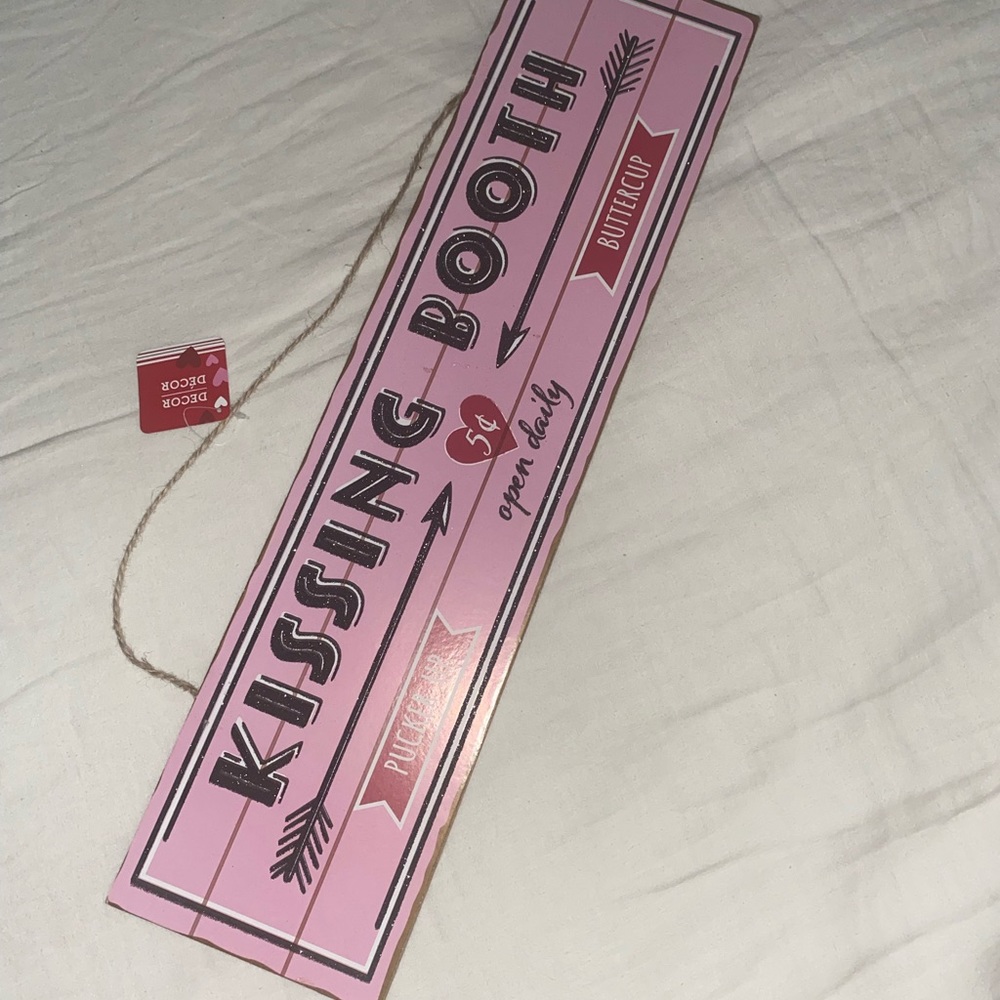 Kissing Booth pink and vintage sings.